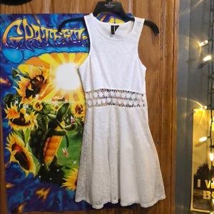 Casual white dress with mid cut out